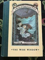 The wide window / by Lemony Snicket ; illustrations by Brett Helquist.